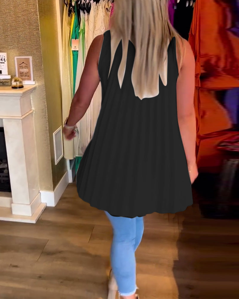 Denise | Sleeveless top with ruffles and lapels