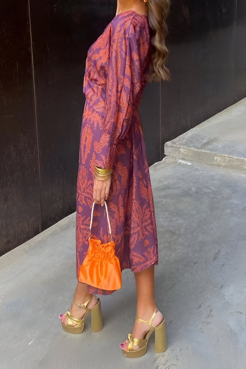 Marie | Elegant midi dress with twist detail and floral pattern