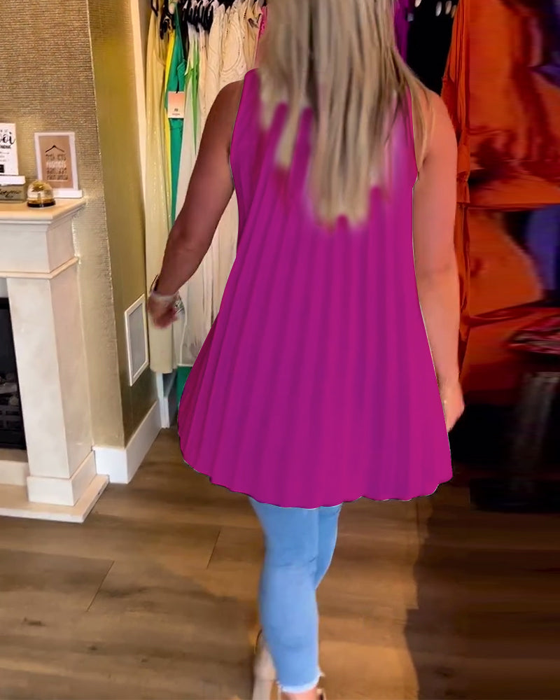 Denise | Sleeveless top with ruffles and lapels