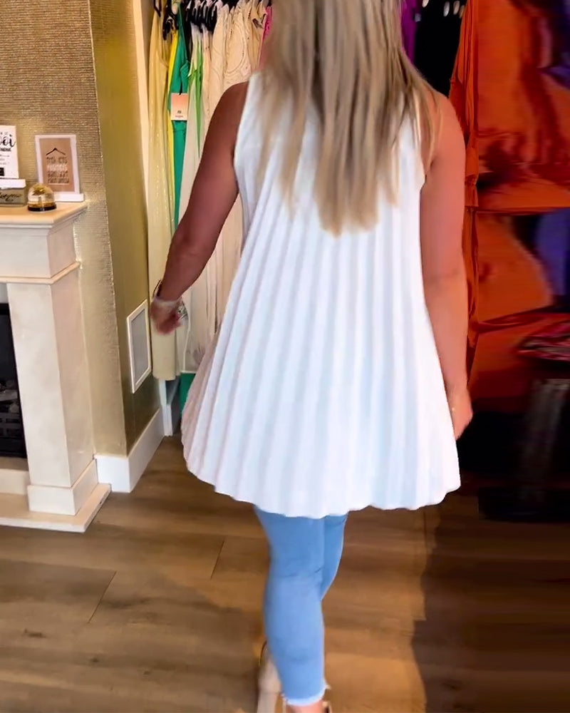 Denise | Sleeveless top with ruffles and lapels